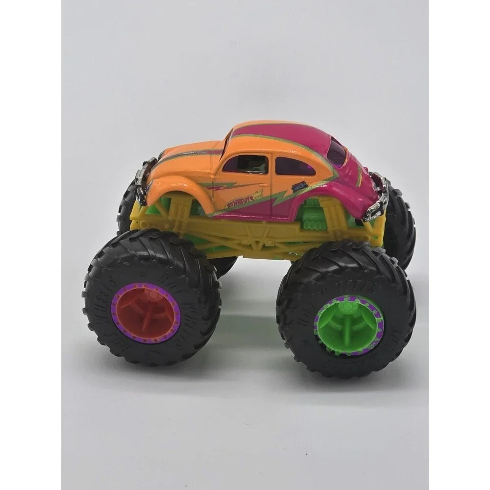 Hot Wheels Monster Trucks VW Beetle Bug Orange w Pink Tampos 1:64 - Mint